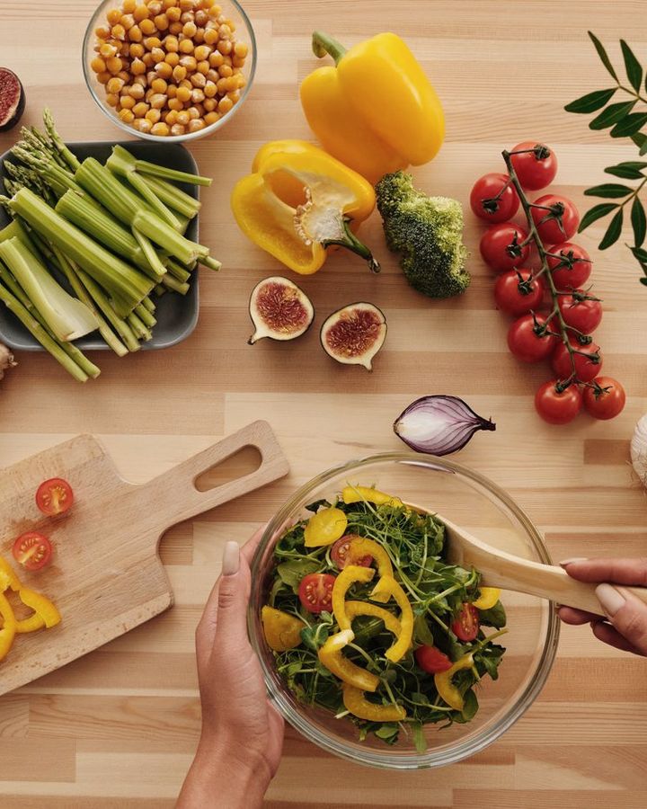 Fresh vegetables prepared on a wooden table