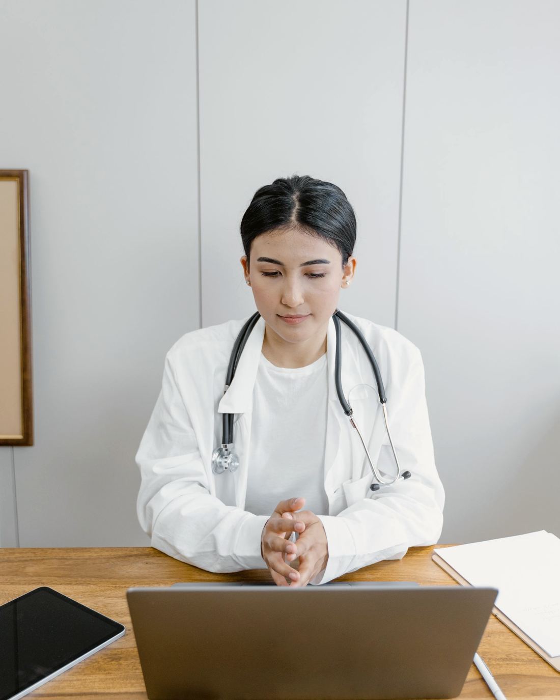 The doctor at her desk